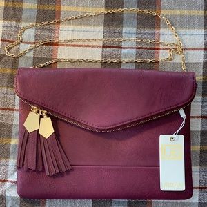Nala Tassel Zip Clutch